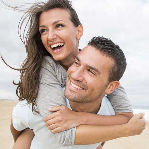 Couple on beach after ketamine treatment in Thousand Oaks, VA